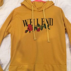 “Well End” Yellow/gold hoodie. With drawstrings.
